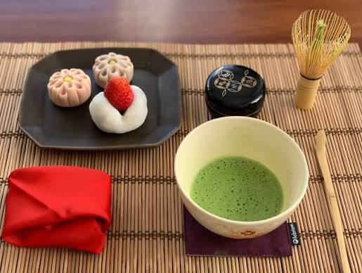 Frothy ceremonial matcha paired with a seasonal wagashi confection