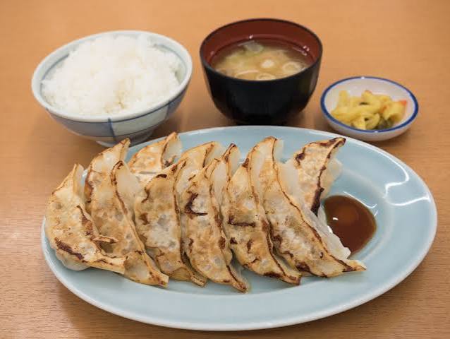 Plates of Utsunomiya's famous pan-fried gyoza dumplings, Japan's gyoza capital