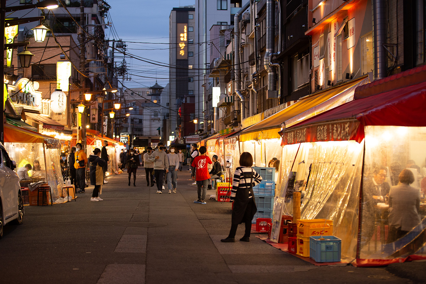 Lantern-lit izakaya stalls lining the narrow alley of Hoppy Street in Asakusa