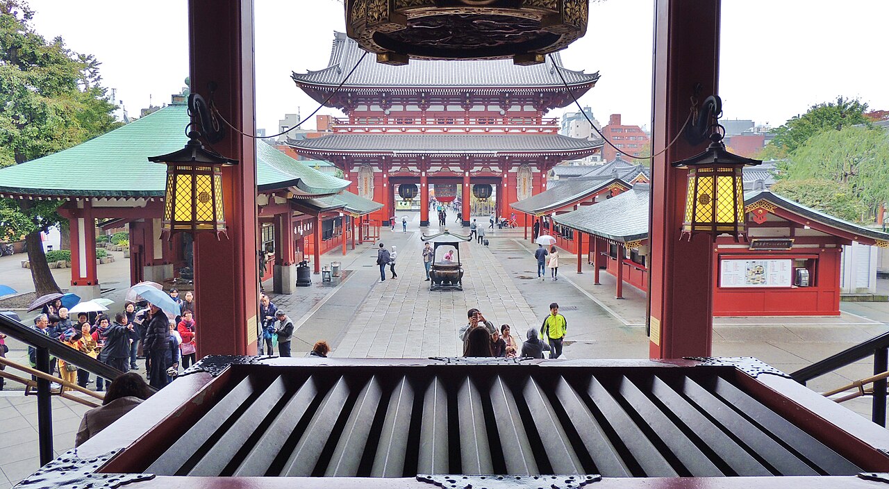 The historic main hall and grounds of Sensoji Temple during daytime in Asakusa Tokyo