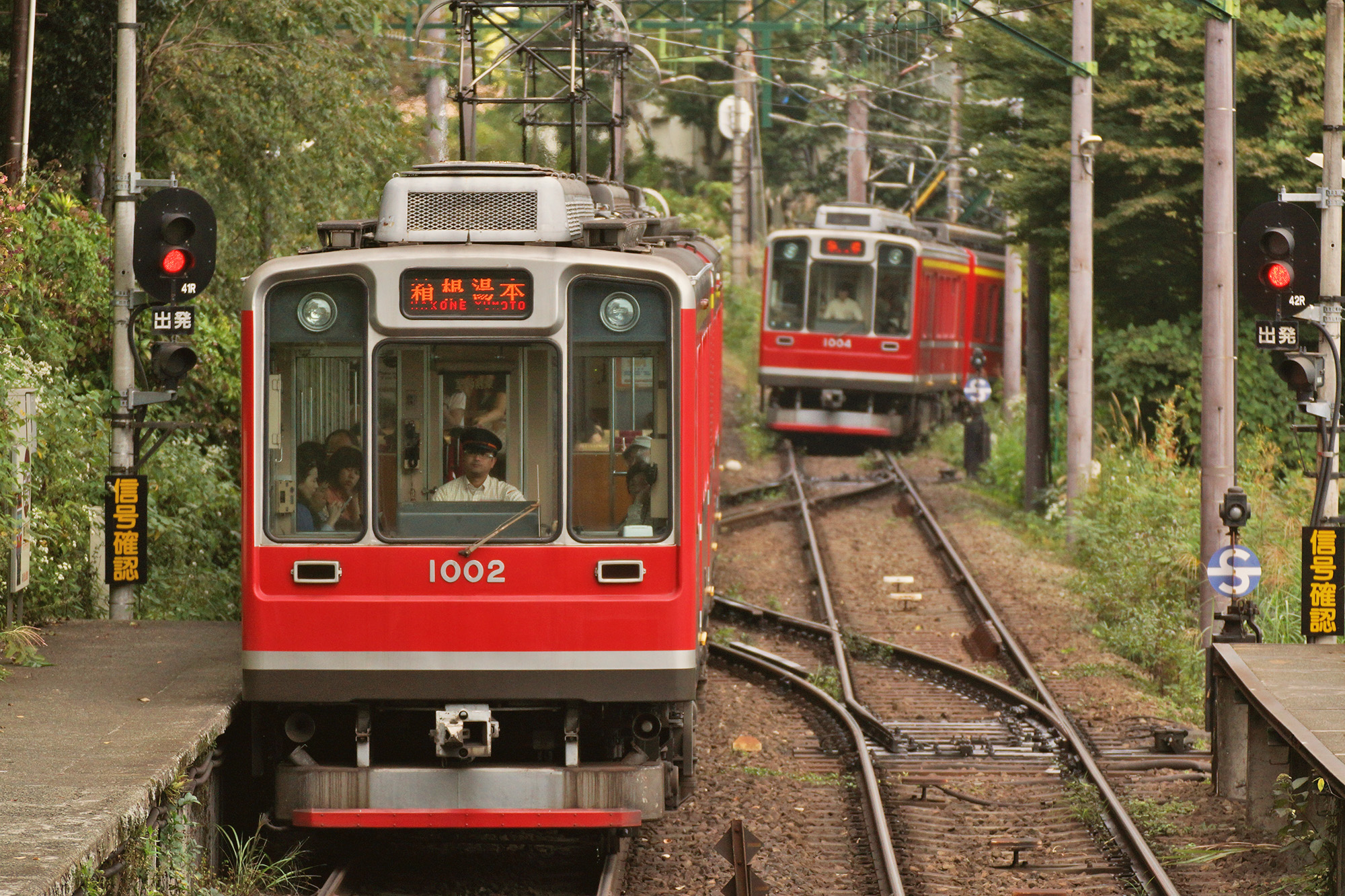 The Hakone Tozan switchback mountain railway climbing through forested hillsides